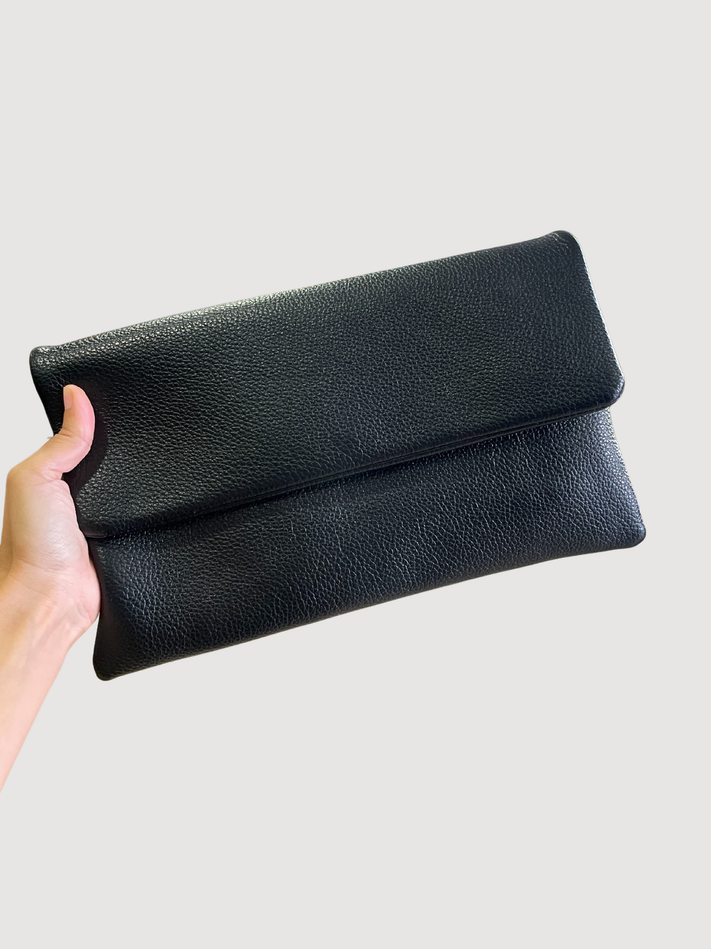 Borsa pochette nera in ecopelle da portare a mano o con tracolla