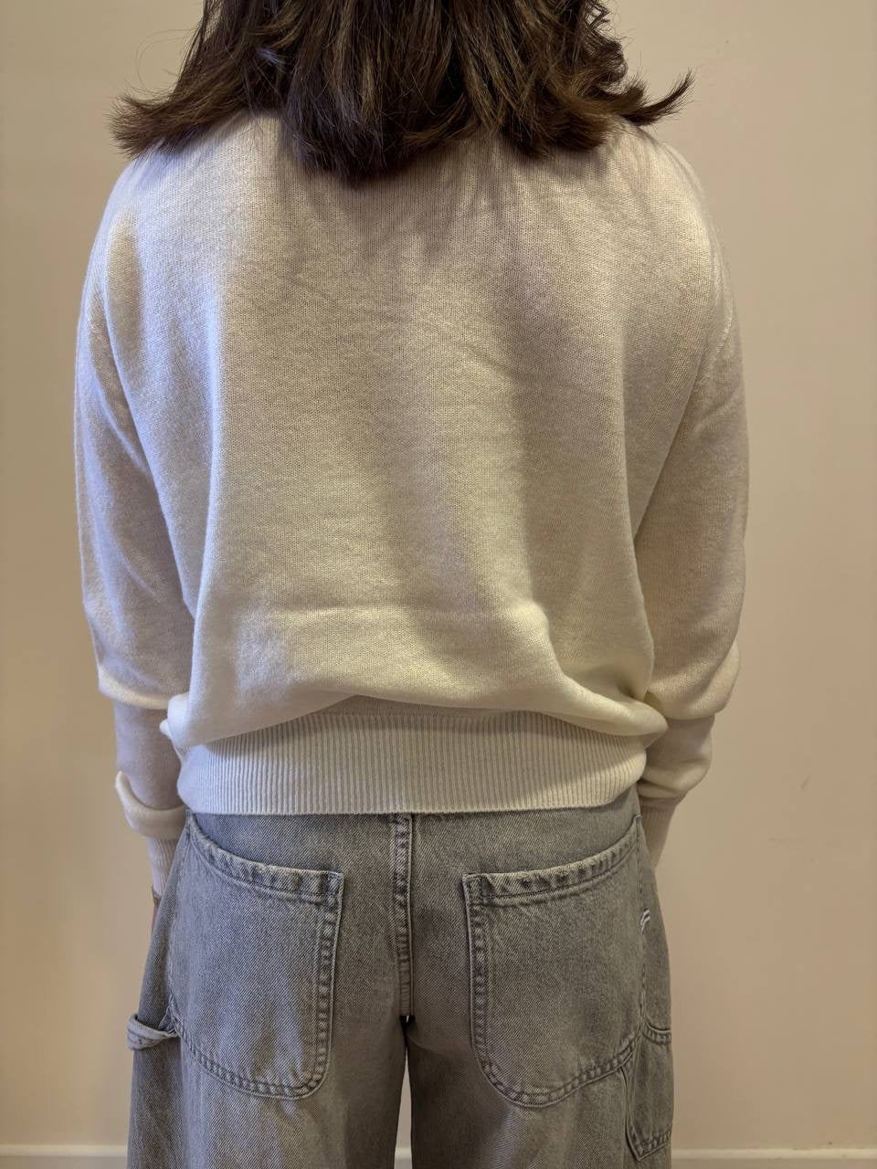 KAOS - Maglioncino in lana pettinata con collo alto color burro - più varianti