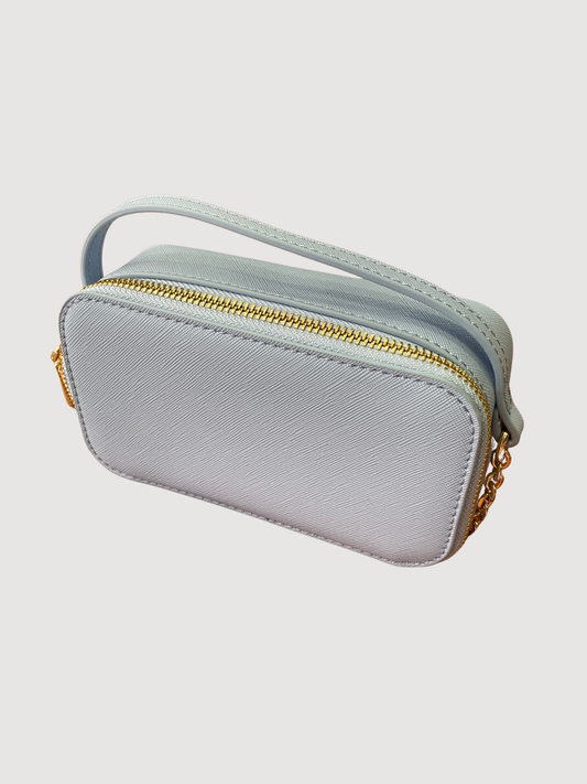 Borsa in ecopelle azzurra a mano con tracolla oro