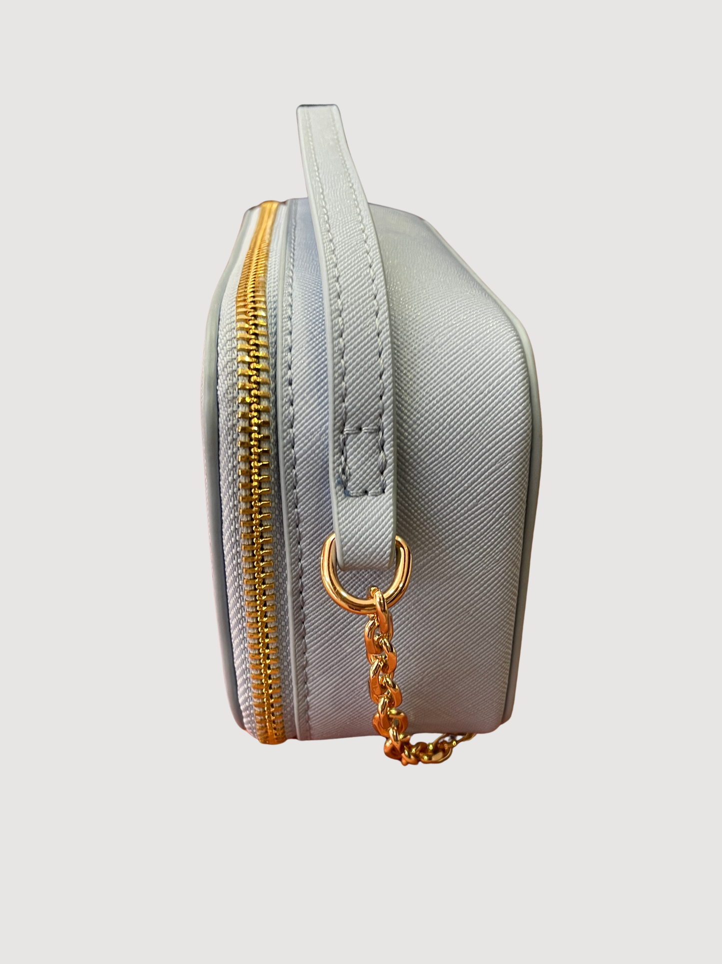 Borsa in ecopelle azzurra a mano con tracolla oro