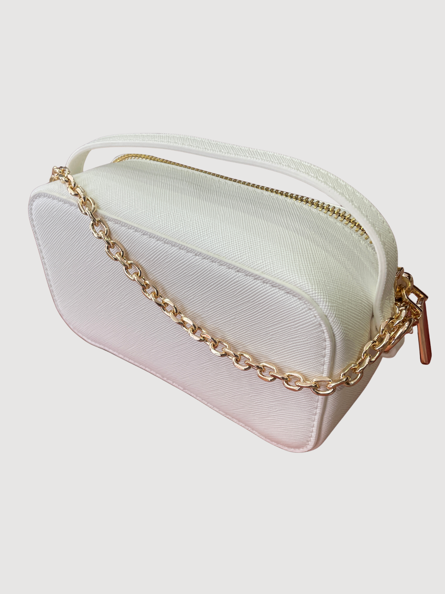 Borsa in ecopelle bianca a mano con tracolla oro