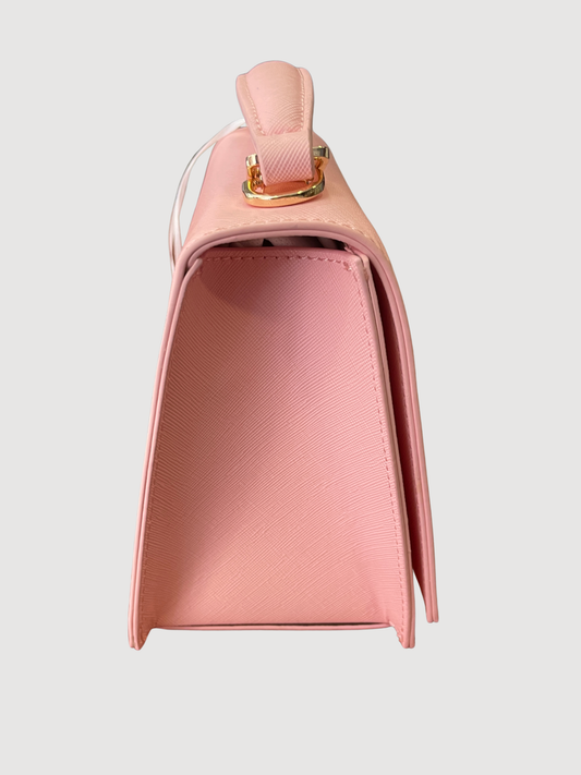 Borsa in ecopelle rosa a mano con tracolla removibile