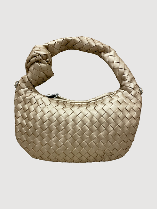 Borsa intrecciata in ecopelle oro con nodo e tracolla