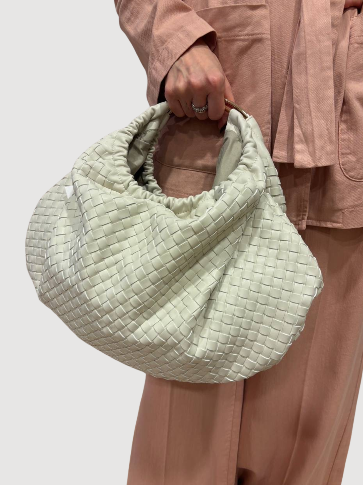 Borsa in ecopelle beige intrecciata con manici