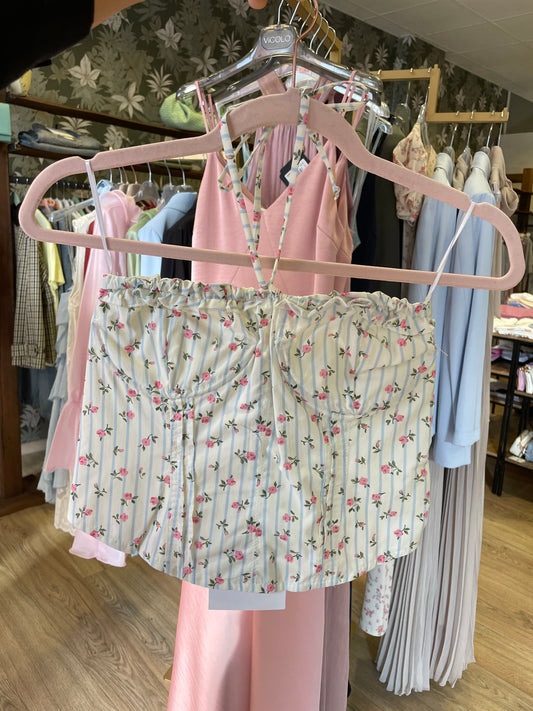 Top con dettaglio fiori e laccetto al collo - più colori